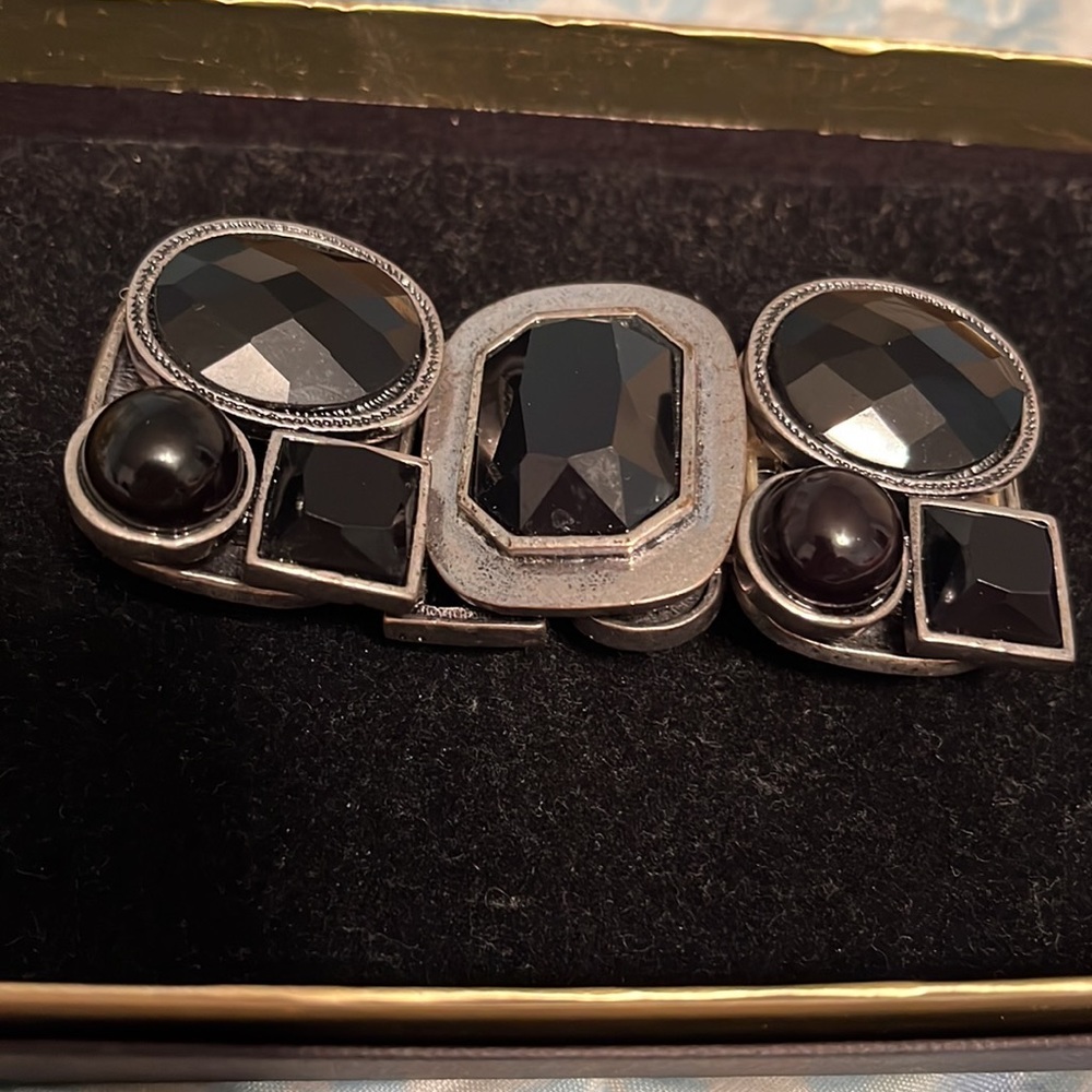 Black and silver stretchy bracelet.